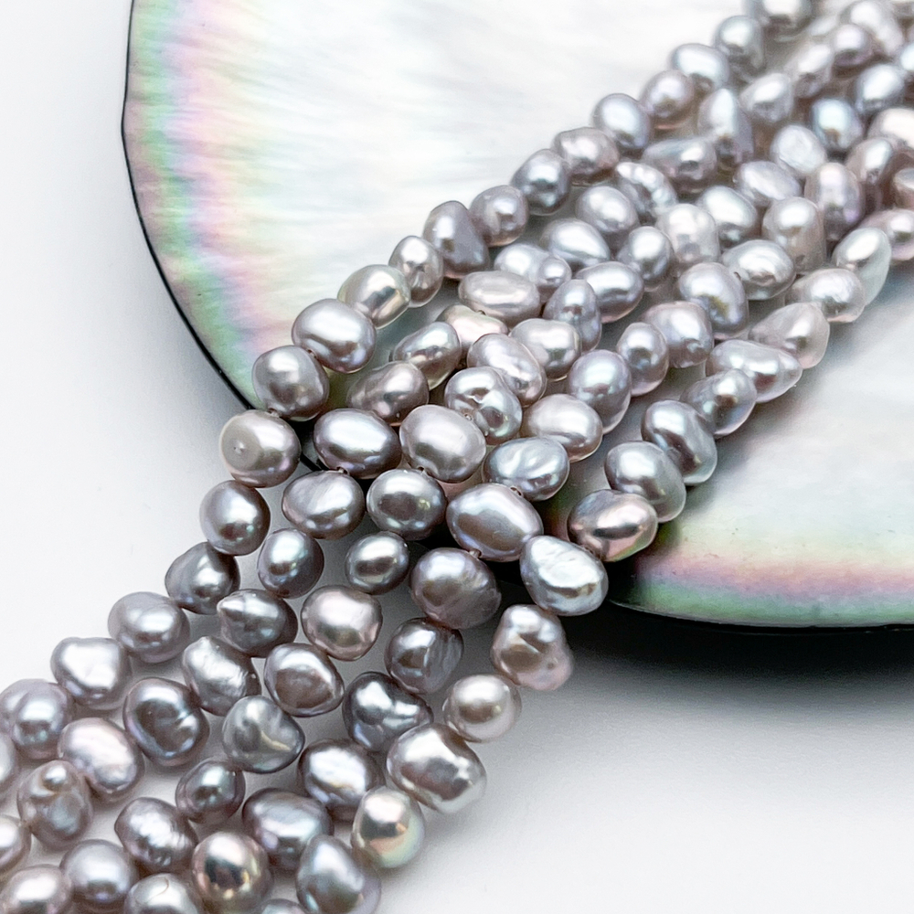 Жемчуг, цвет серый, размер около 4,5*5,3 мм, цена за отрезок 19 см (1/2 нити)