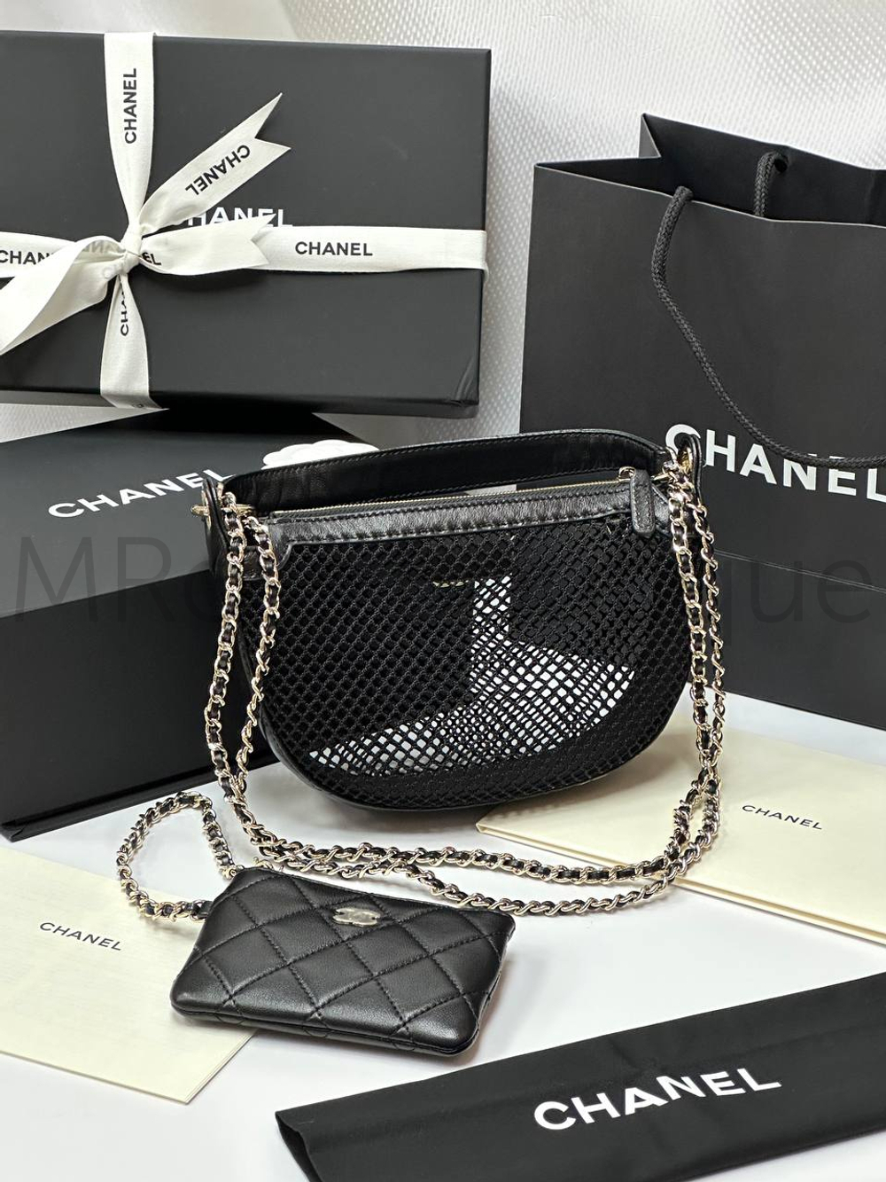 Женская сетчатая сумка Chanel черного цвета