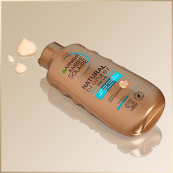 Garnier Ambre Solaire Natural Bronzer - тонирующее молочко для постепенного загара /   200  ml  / GTIN 3600542450683