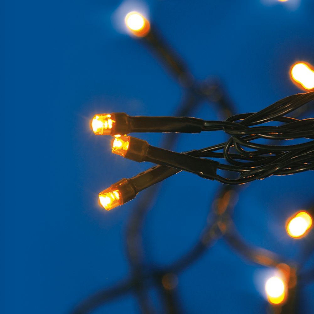 ULD-S2000-200-DGA AMBER IP20 Гирлянда светодиодная. 20м. 200 светодиодов. Янтарный свет. Провод зеленый. ТМ Uniel