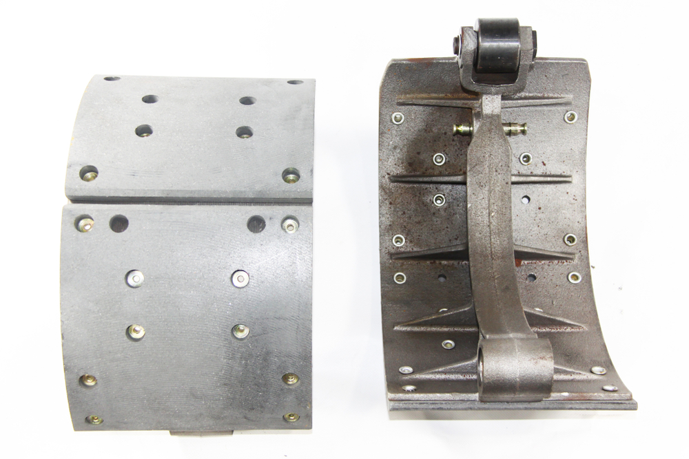 Колодка барабанного тормоза китайский мост HanDe DH7131.200хх 16 тонн, а/м  SHAANXI F3000, КАМАЗ (заднего моста автобус) (1шт./ ширина 220 мм./ с роликом / 8+10 отверстий разные накладки/ литая/ DZ9112340060) Набережные челны