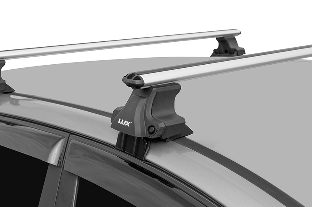 Багажник D-Lux 1 на гладкую крышу аэро дуги 130 см.