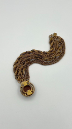 Браслет с коричневым кристаллом