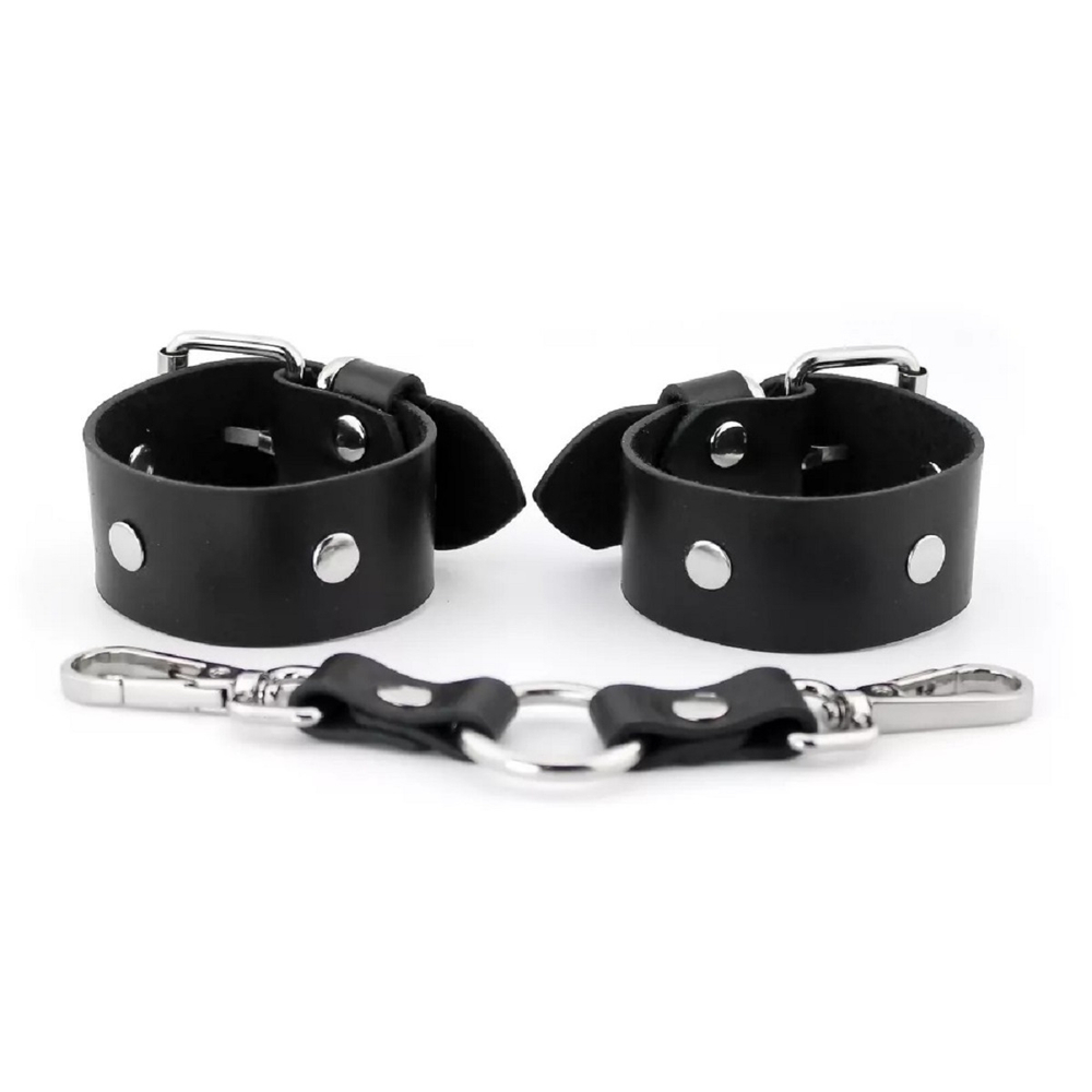 Наручники узкие с заклепками кожа черный