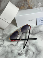 Солнечные очки Prada