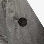 NLN_GMD_JCKT Metal Effect Grey