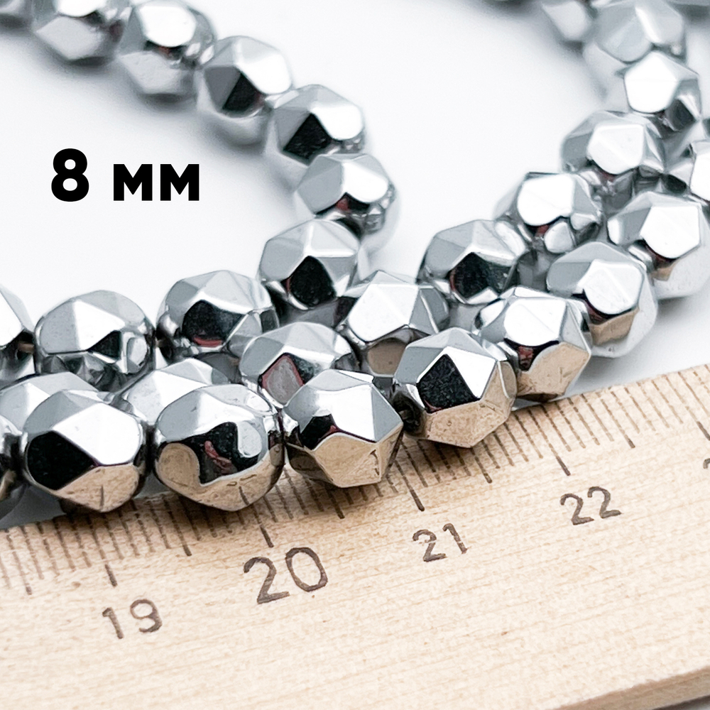 Гематит Крупная огранка бусины (имитация), цвет серебристый, размер около 8,2*7,8 мм, цена за 12 шт (1/4 нити)