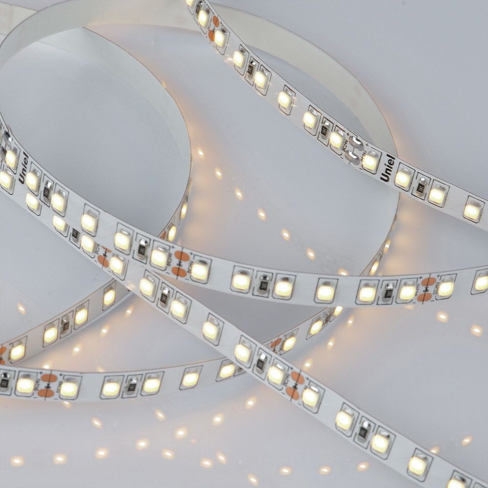 ULS-2835-120LED-m-8mm-IP20-DC24V-9.6W-m-5M-3000K Гибкая светодиодная лента на самоклеящейся основе. Катушка 5 м. в герметичной упаковке. Белый свет 3000K. ТМ Uniel.
