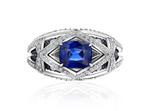 Кольцо с сапфиром Royal blue огранки "Кушон" с обсыпкой из бриллиантов и сапфиров