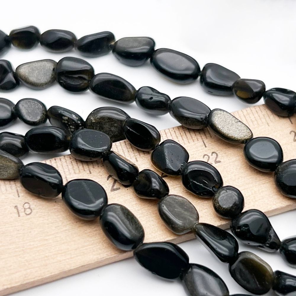 Обсидиан "Золотой" бусины, галтовка, размер около 6-10 мм, цена за нить 38 см Обсидиан "Золотой" бусины, галтовка, размер около 6-10 мм, цена за нить 38 см