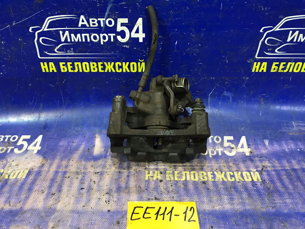 Суппорт тормозной задний левый TOYOTA COROLLA 1999