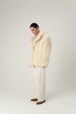 Молочная шуба