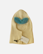 Молочная балаклава с голубыми бровями из меха норки