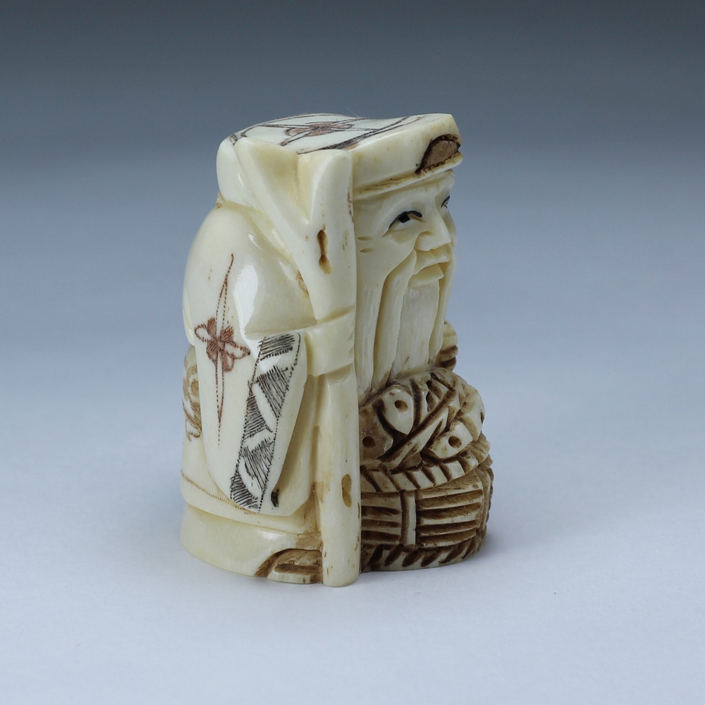 Нэцкэ Дзюродзин с корзиной карпов и посохом