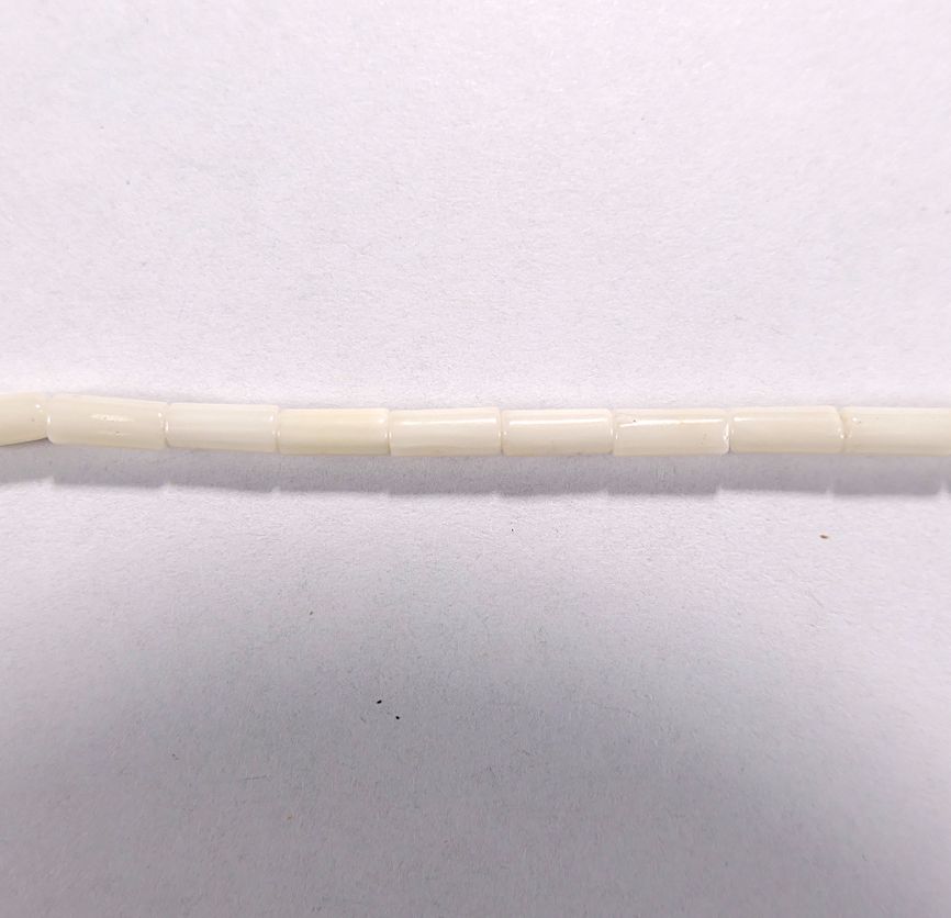 Бусина из коралла белого, облагороженного, фигурная, 3x7 мм (цилиндр, гладкая)