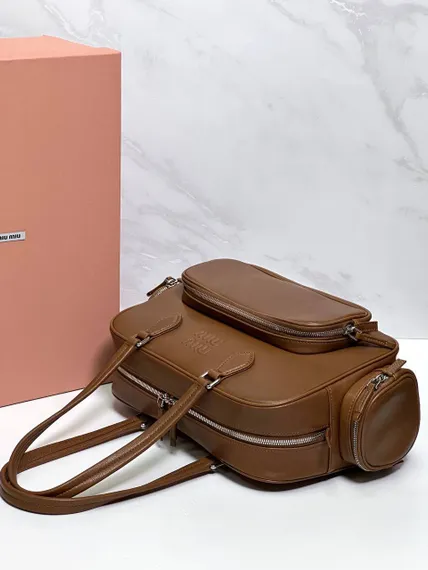 Женская сумка MIU MIU Pocket с верхней ручкой из кожи nappa, коричневая