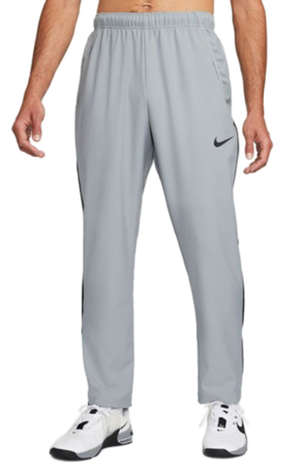 Мужские теннисные штаны Nike Dri-Fit Woven Team Training Trousers - particle grey/black/black