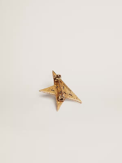 Antique gold-colored brooch with decorative crystals