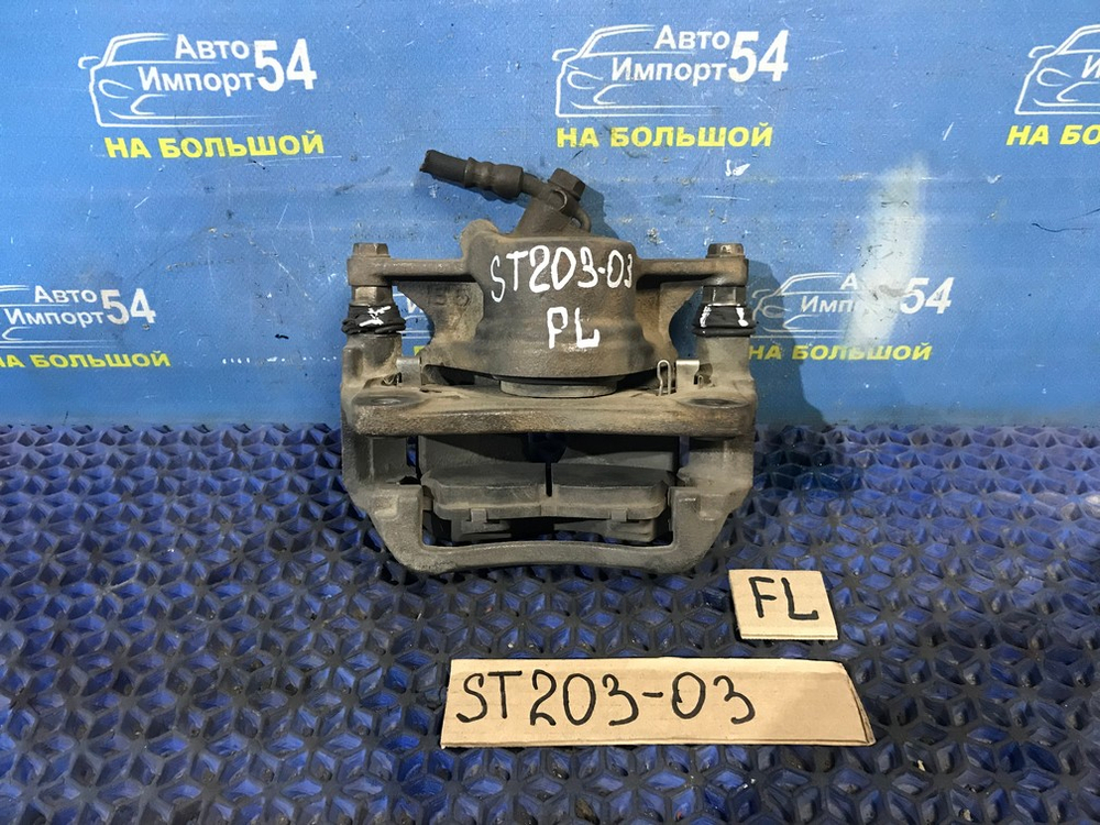 Суппорт тормозной передний левый TOYOTA CORONA EXIV 1996