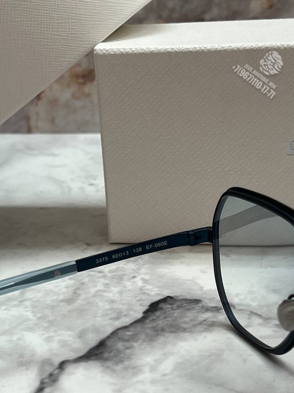 Солнечные очки Prada