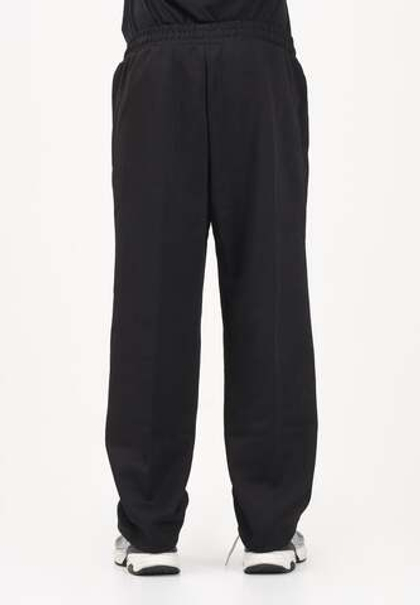 Брюки спортивные мужские PUMA T7 Relaxed Big Cat Track Pants op DK