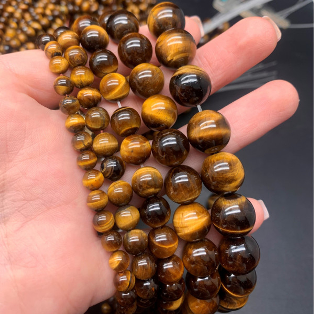 12118-10 Тигровый глаз, шар гл. 10 мм, нить 19см