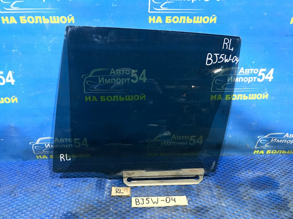 Стекло двери задней левой MAZDA FAMILIA 1999