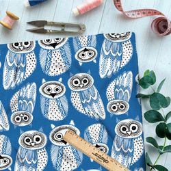Ткань кулирная гладь пуховые совы на синем фоне
