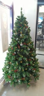 Заснеженная елка с гирляндой «Очарование» с шишками и ягодами (Леска+пвх) 180 см / 1.8 м