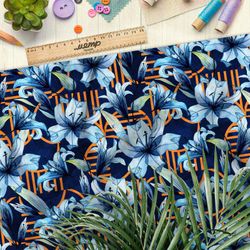 Ткань кулирная гладь акварельно-голубые цветы на синем фоне