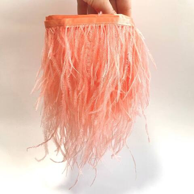 Перья страуса на ленте лосось (перьевая тесьма) 10 - 15 см.