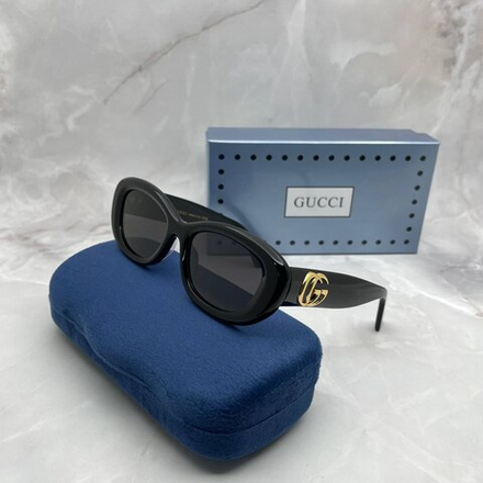 Солнцезащитные очки Gucci