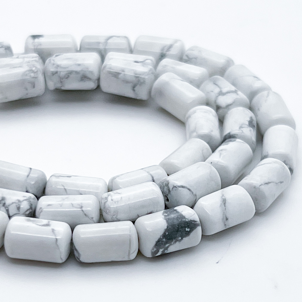 Магнезит, размер около 10,3*6,5 мм, цена за 9 шт (1/4 нити)