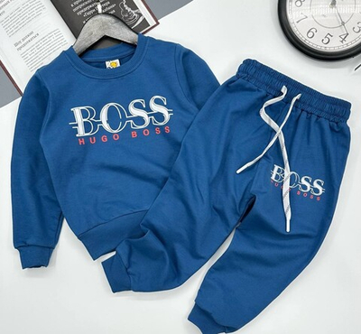 Костюм на мальчика из кофточки и штанишек с завязками из 100% хлопка синий цвет ,на рост 98,104,110,116,122 см