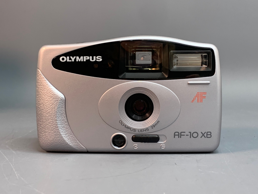 Olympus AF-10 XB не включается