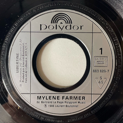 Винтажная виниловая пластинка 7 дюймов (маленькая пластинка) Mylene Farmer Libertine (Франция 1986)
