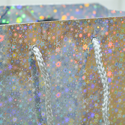 Пакет бумажный 18*23+10см с ручками Голография микс MG213-214