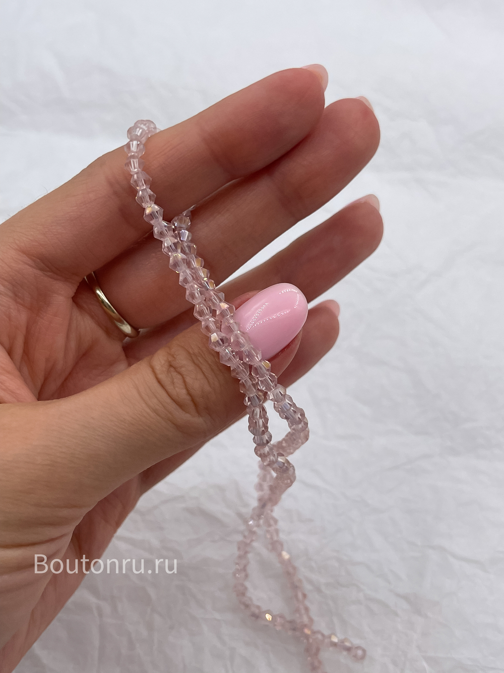 Бусины стеклянные биконусы на нити розовые