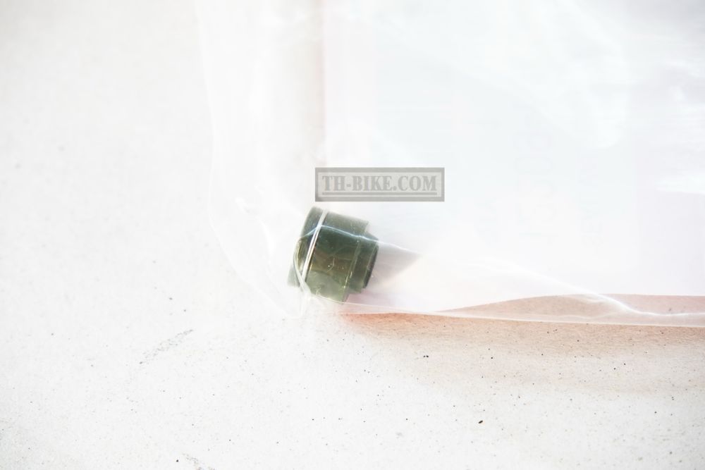 12209-ML0-722. SEAL, VALVE STEM (ARAI)