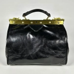 Ретро-саквояж из натуральной кожи черного цвета