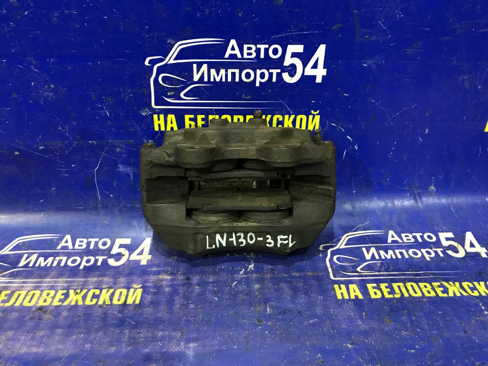 Суппорт тормозной передний левый TOYOTA HILUX SURF 1992