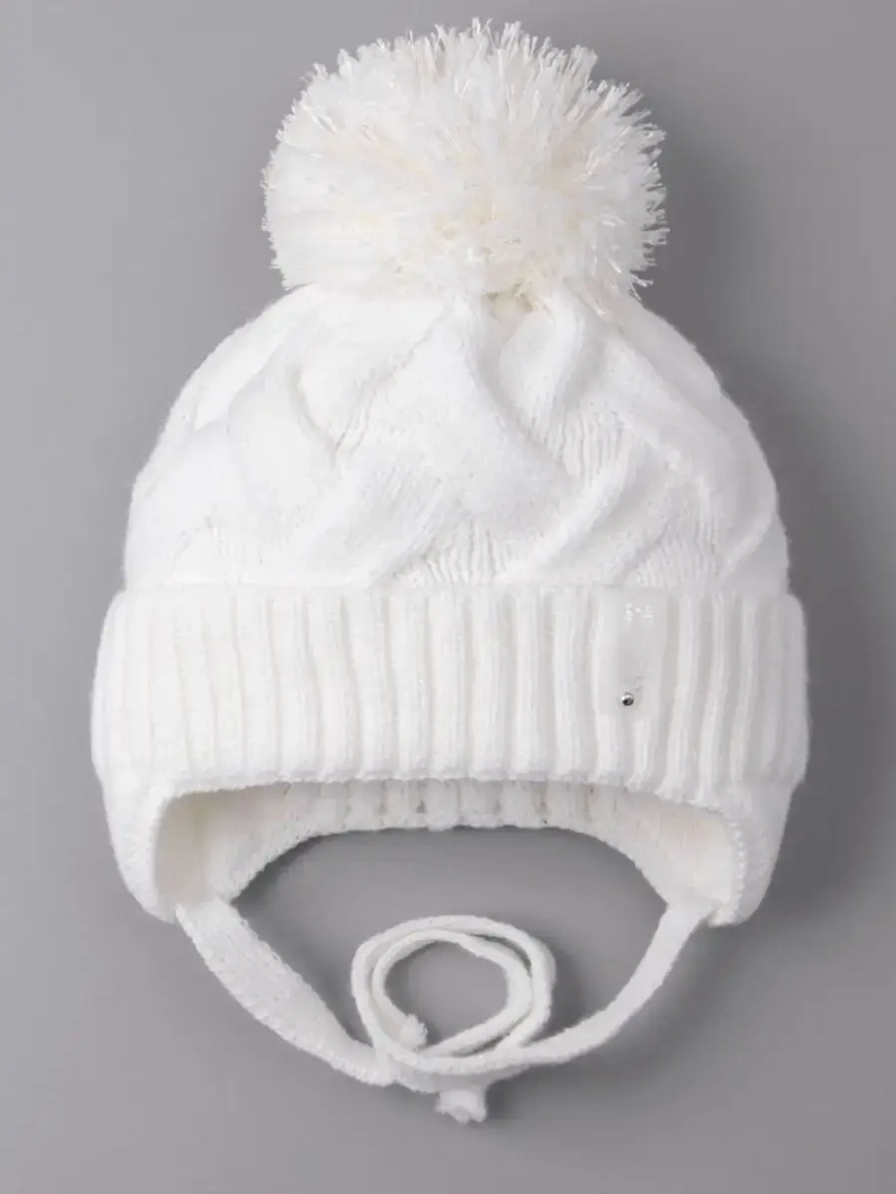 Шапка для девочки на завязках на осень