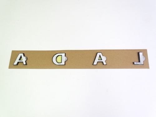 Эмблема задн.-надпись  LADA  новый черный лак. (TLT)