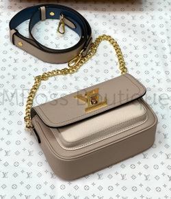 Сумка Lockme Tender Louis Vuitton серого цвета