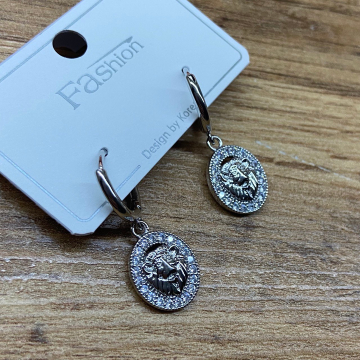 Серьги кольца Лев в оправе циркон металл серебристый