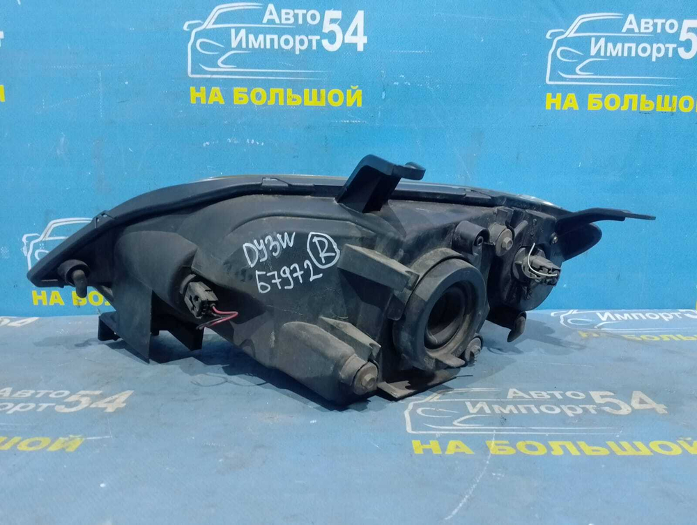 Фара передняя правая MAZDA DEMIO 2002-2005