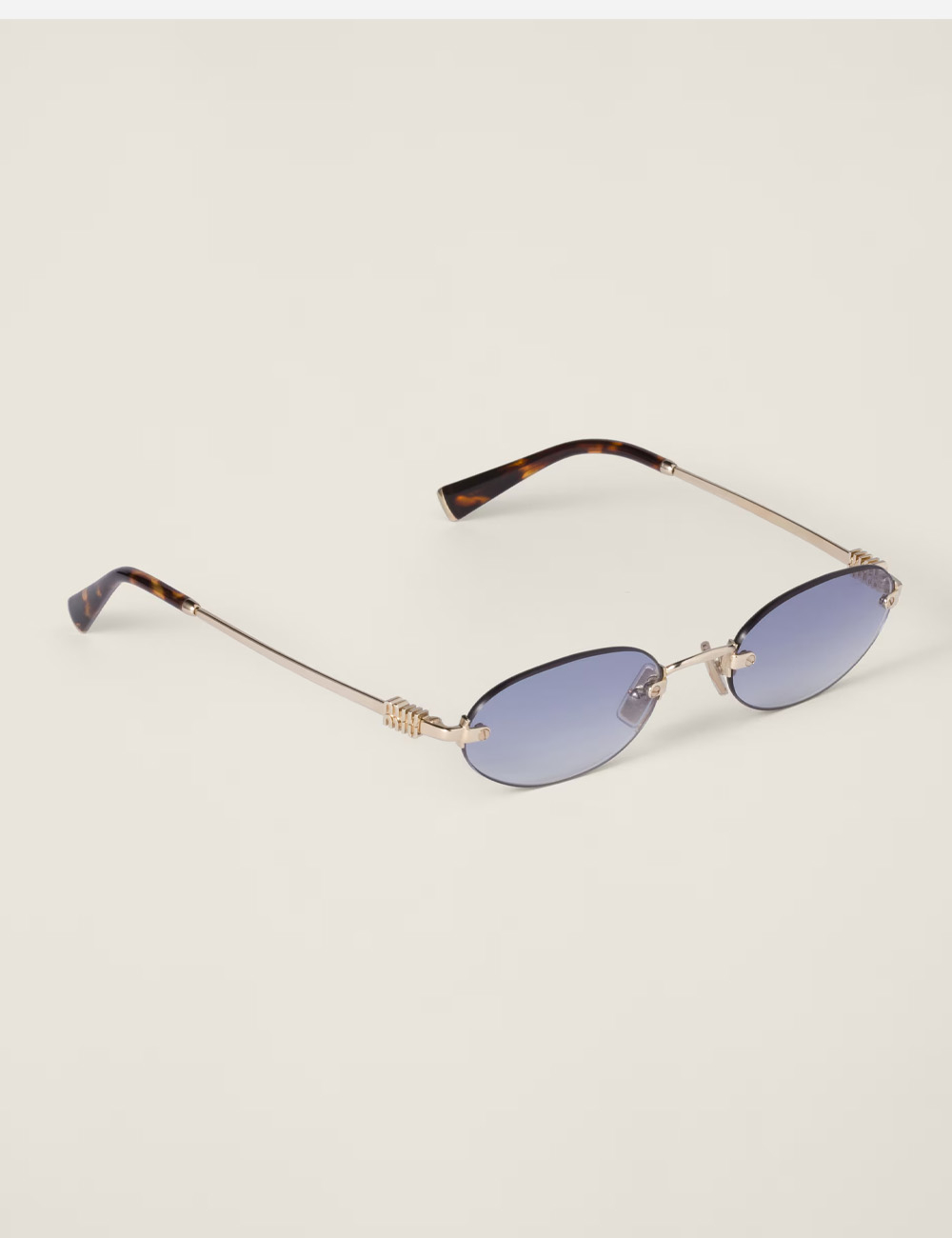 Солнцезащитные очки Miu Miu Logo Indigo lenses