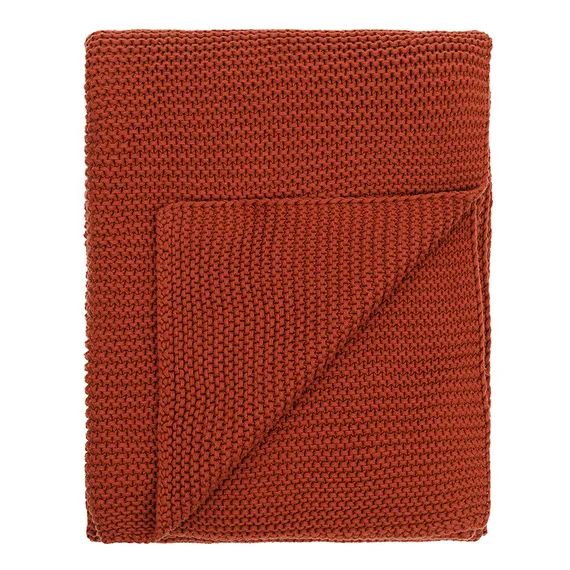 Плед из хлопка жемчужной вязки терракотового цвета из коллекции essential, 130х180 см