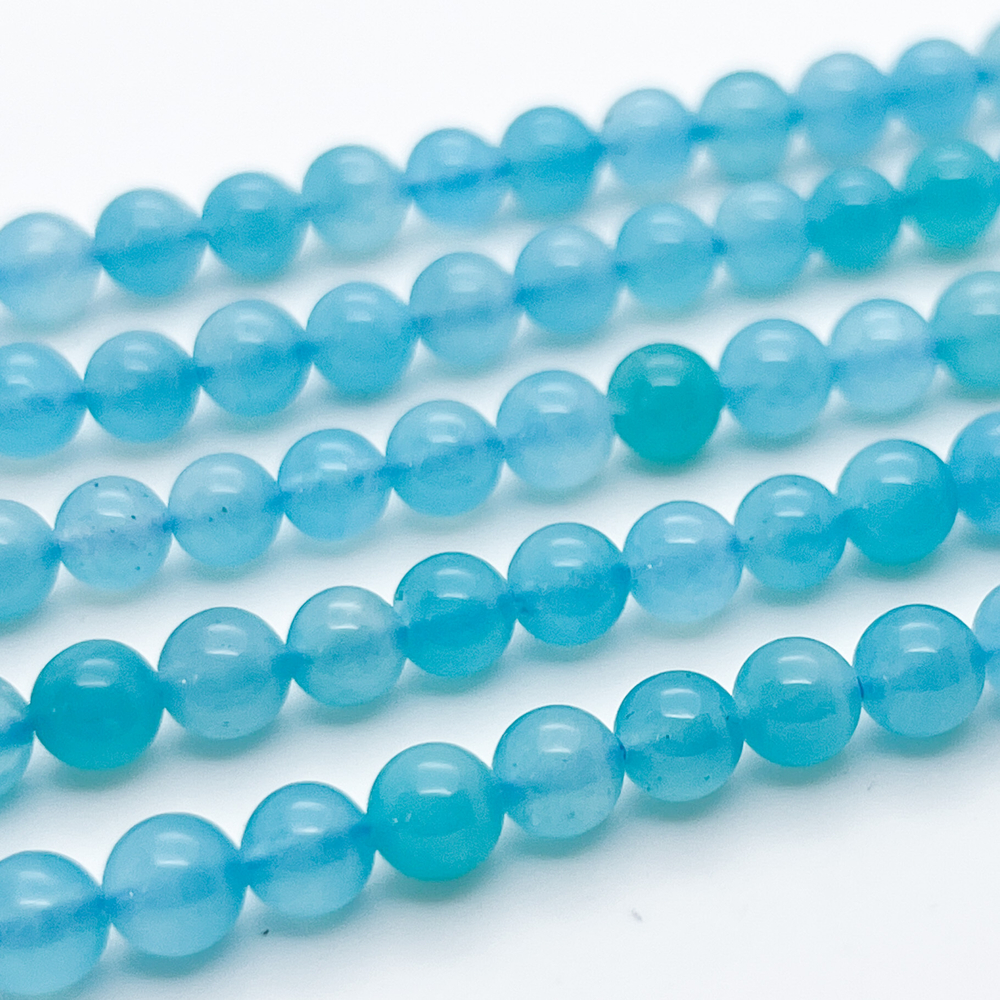Амазонит, диаметр 5,4-5,8 мм, цена за 33-34 шт (1/2 нити)