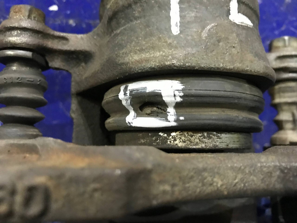 Суппорт тормозной передний левый NISSAN PULSAR 2000